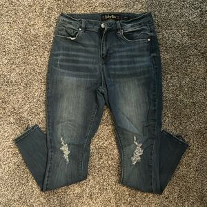 Size 11 high waist curvy distressed skinny jeans.